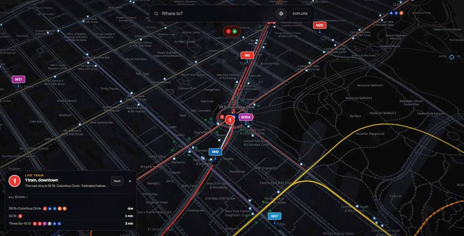 NYC Transit Live zoomed in on 59 St–Columbus Circle: a live detail card tracks a downtown 1 train at the station while nearby buses and the station's route bullets surround it